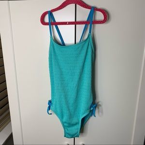 Girl’s Justice One-Piece Side Tie Swimsuit